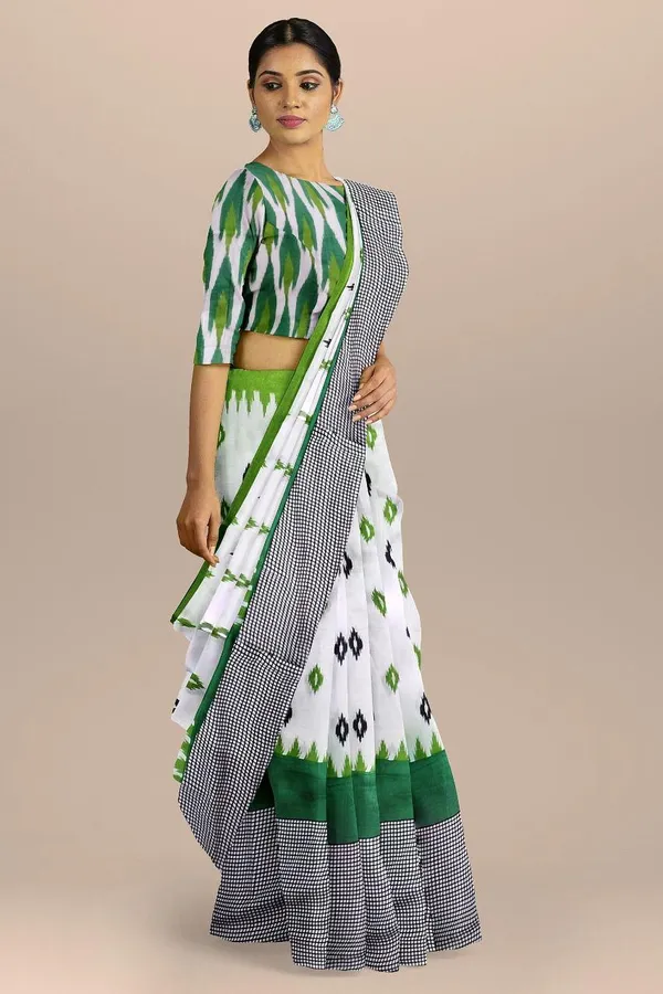 https://d1311wbk6unapo.cloudfront.net/NushopCatalogue/tr:f-webp,w-600,fo-auto/RAGINI GREEN WHITE_1685087440510_qpz6u46c2ub08f3.jpg__Ethnic Bird